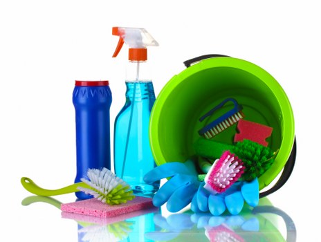 Preparing a home for move out cleaning with supplies and empty rooms