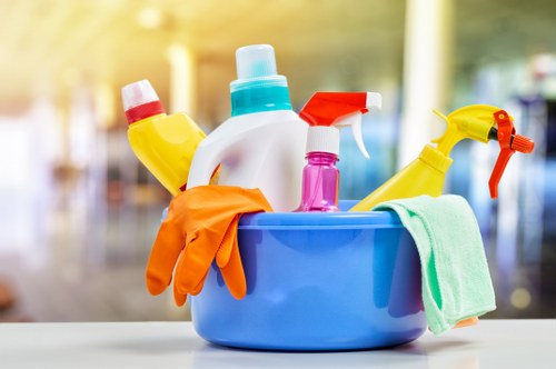 Cleaning team polishing surfaces after renovation work