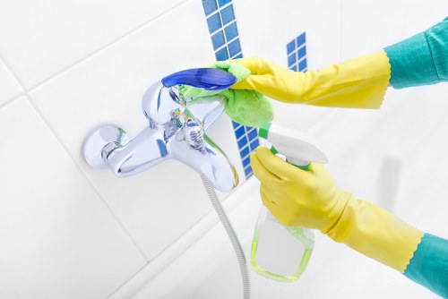 Health-focused regular cleaning of kitchen and bathroom surfaces