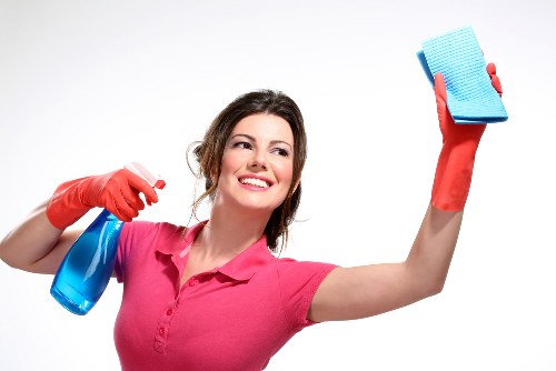 Professional Airbnb cleaning service preparing a vacation rental